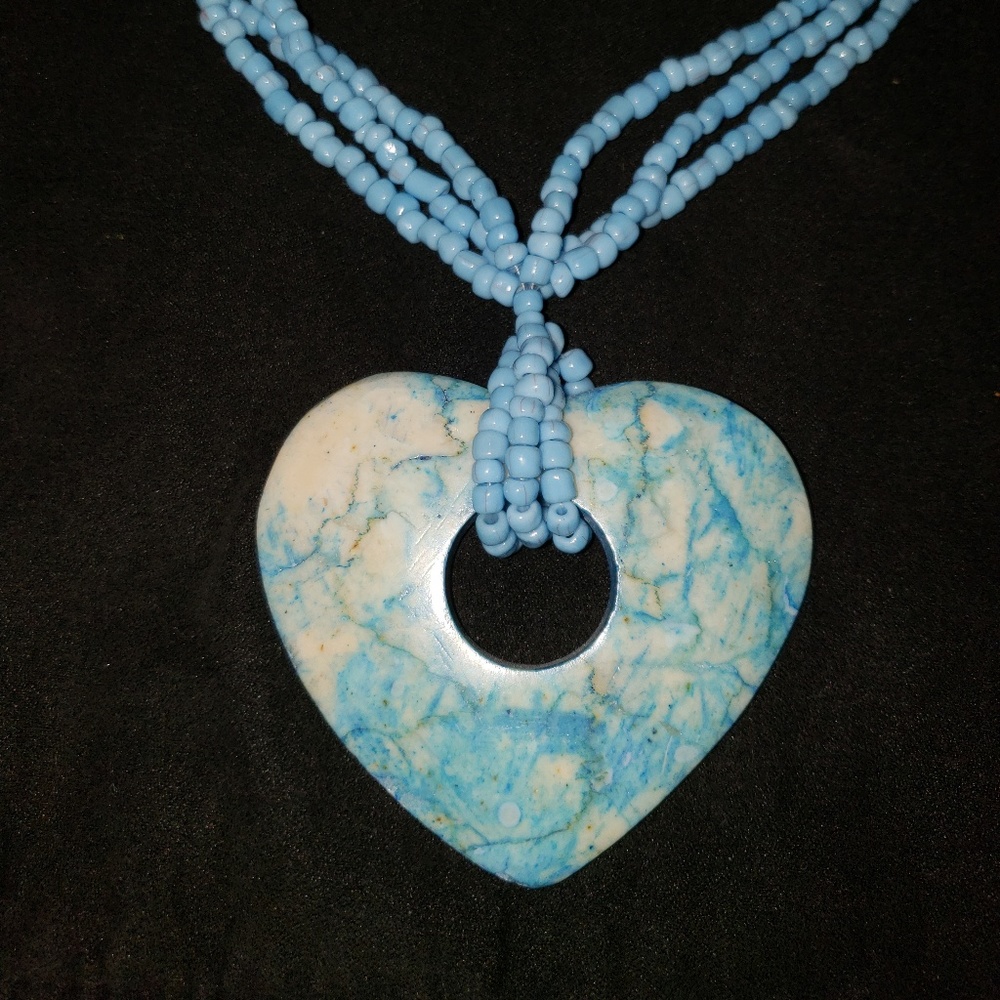 Turquoise beaded necklace w/ heart stone